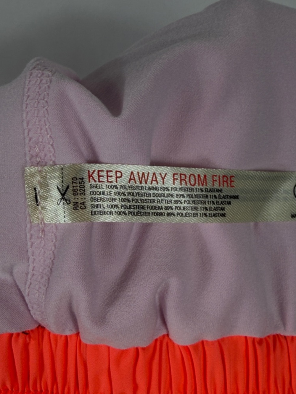 FP Movement Invigorate Colorblock Shorts Neon Coral, Blush & Plum. Size M. NWT - Picture 8 of 8